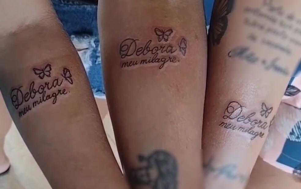 Amigas fizeram tatuagens em homenagem Dbora Barros dos Santos de 25 anos suspeita de fingir que tinha leucemia para aplicar golpes em colegas de trabalhos em Pirenpolis Foto ReproduoRedes Sociais
